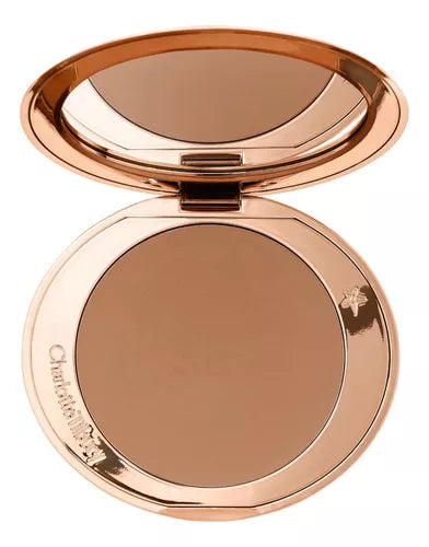 A matte bronzing filter for face and body  2 medium moyen